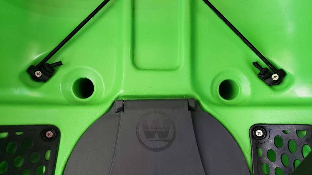 Scupper holes of a Wilderness Systems Tarpon 105 sit-on-top kayak.
