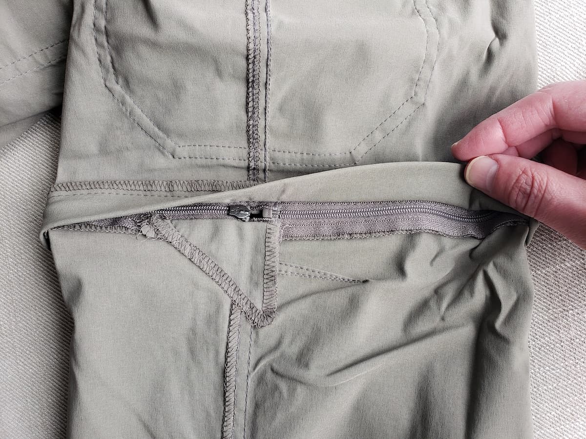 View of the zipper from the inside view of KÜHL's Stealth Zip Off System on the Renegade Cargo Convertible Recco Pant.