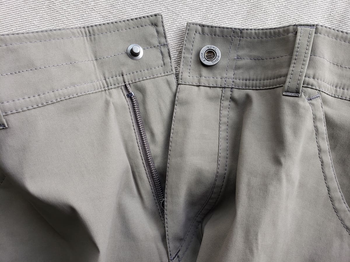 The Renegade Cargo Pant has a snap and a zipper at the waist.
