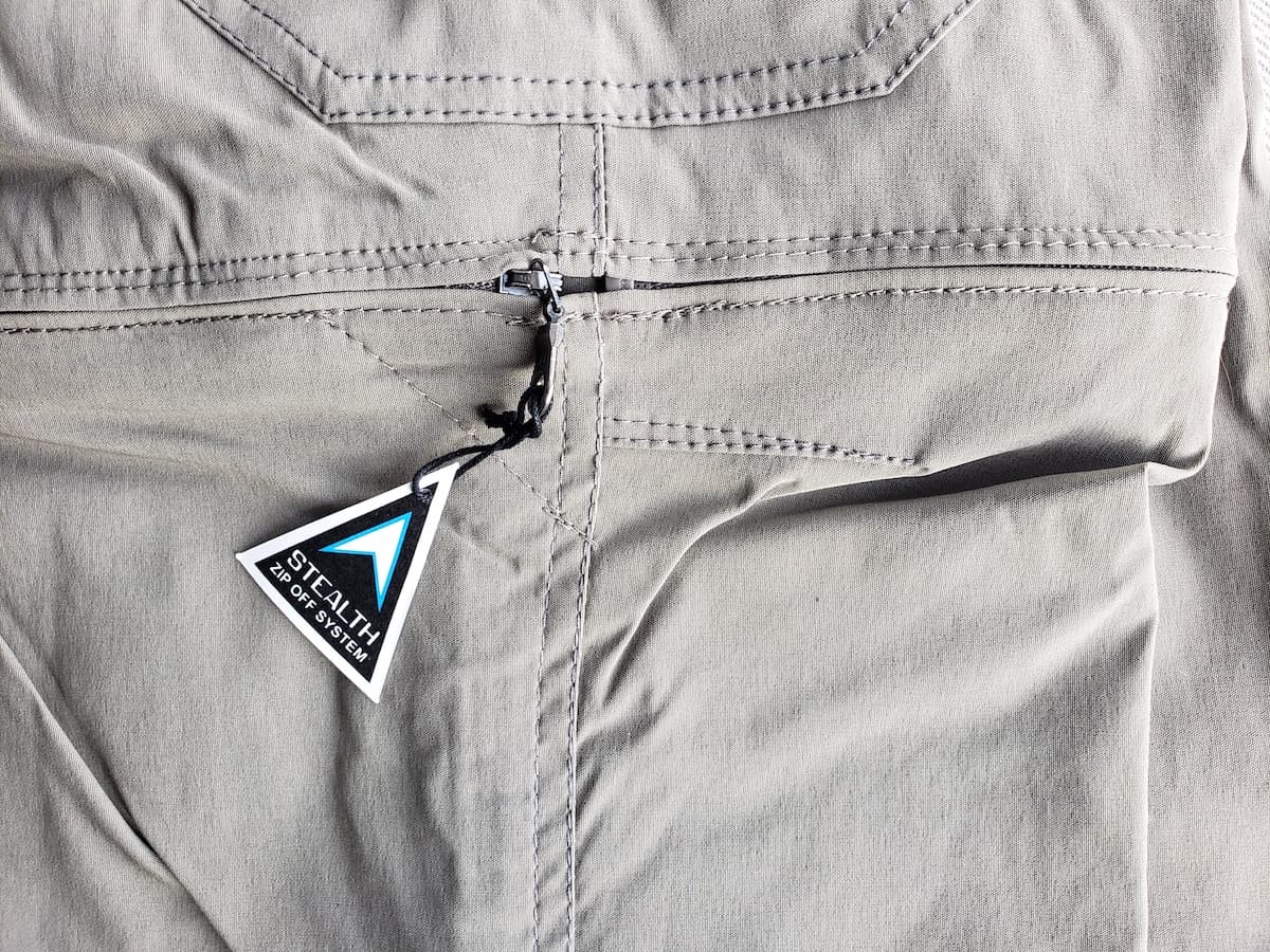Outer/side view of KÜHL's Stealth Zip Off System on the Renegade Cargo Convertible Recco Pant.
