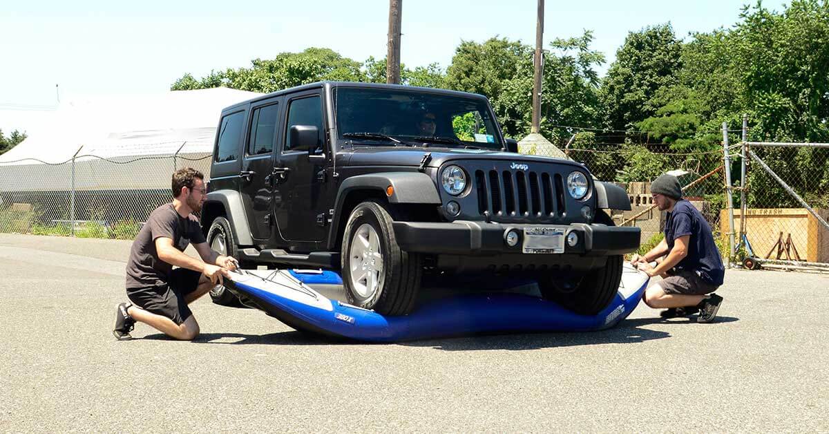 Durability test of a Sea Eagle 380x Explorer. Running over the inflatable kayak with a Jeep Wrangler.