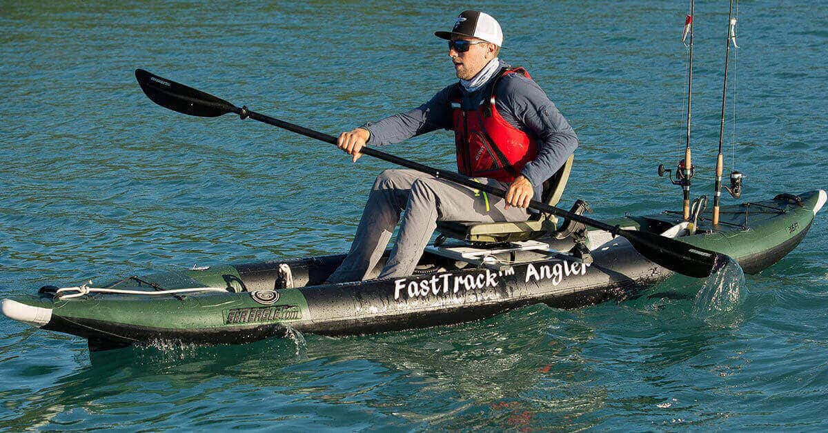 Fisherman solo paddling a Sea Eagle 385fta FastTrack Angler inflatable kayak.