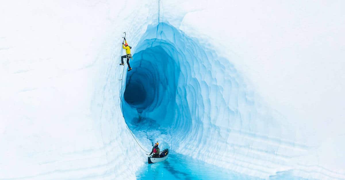 Two-person extreme exploration ice climbing of a glacier with use of a Sea Eagle Inflatable Travel Canoe 16.