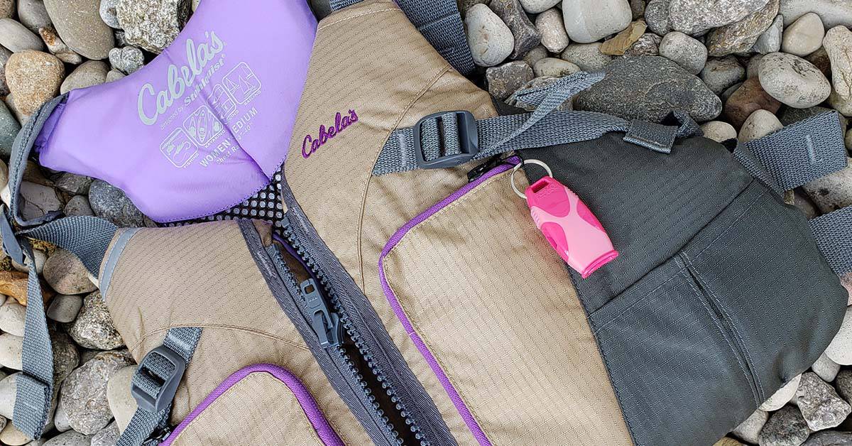 My wife's Cabela's PFD with the pink Fox 40 Sharx. The slip resistant covering of the Sharx safety whistle is perfect for use on the water.