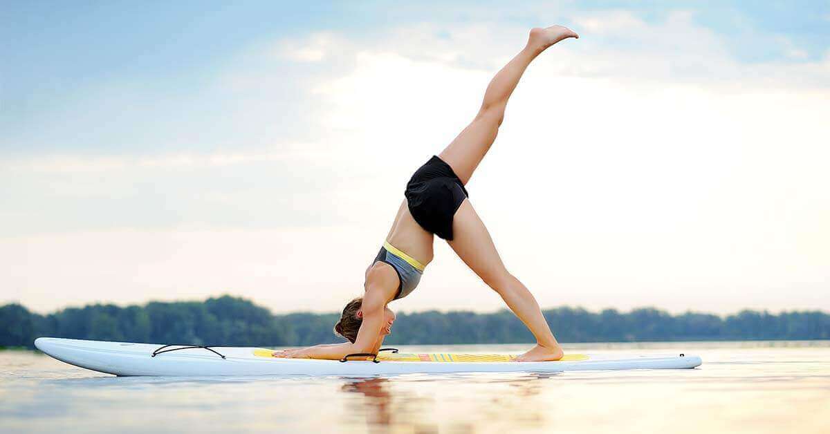 Stand-up paddle board (SUP) yoga basic poses.