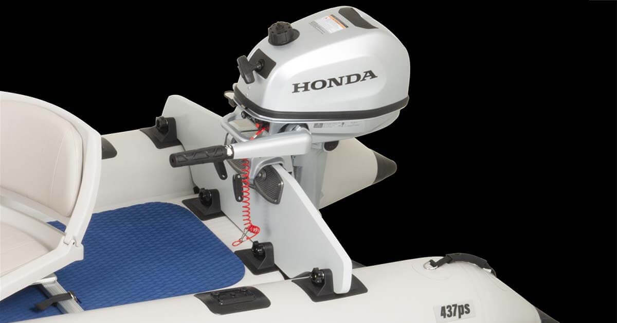 A Honda 5S outboard motor mounted to the removable transom of a Sea Eagle 437ps PaddleSki Inflatable Catamaran-Kayak-Boat.
