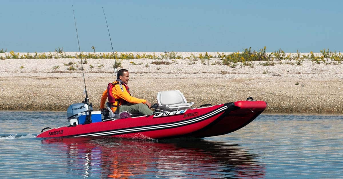 The Sea Eagle FastCat12 will quickly get you to your favorite fishing spot when paired with the Honda 5 hp four-stroke outboard motor.