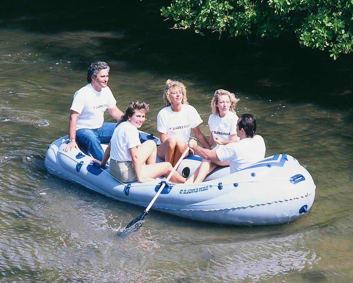 Five people on a river in a Sea Eagle SE9 Motormount Inflatable Raft.