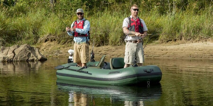 Two fishermen standing and fishing from a Sea Eagle Stealth Stalker 10 Inflatable Fishing Boat.