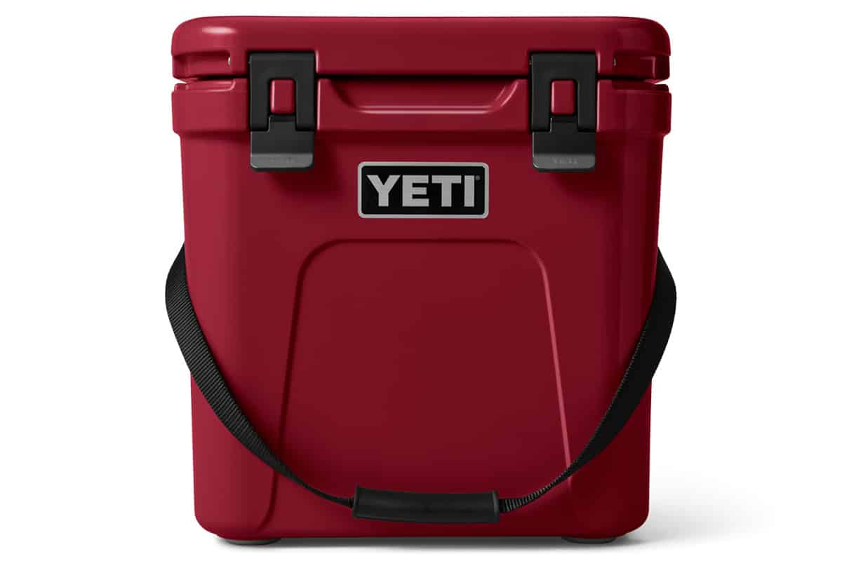 The front of a Yeti Roadie 24 Hard Cooler in Harvest Red.