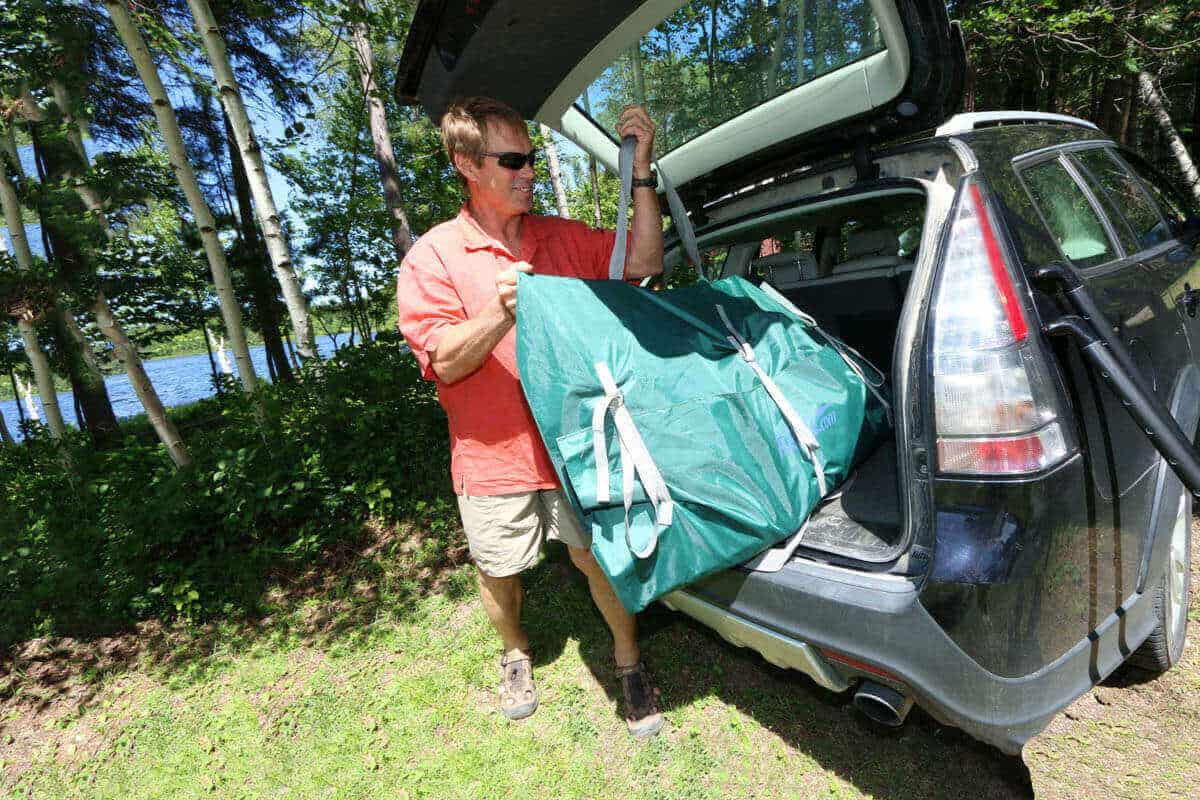 The Sea Eagle TC16 Travel Canoe packs down into a carry bag to fit into the trunk of a car.
