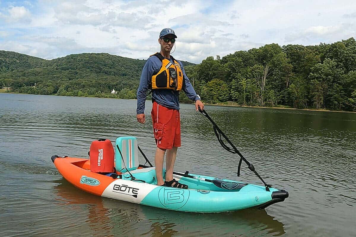 I'm using the Rogue Gear Adjustable Drag Strap as a stand assist strap while being propelled by a Boost Fin while my drinks stay cold in an ICEMULE cooler in the back of my Bote Zeppelin Aero.