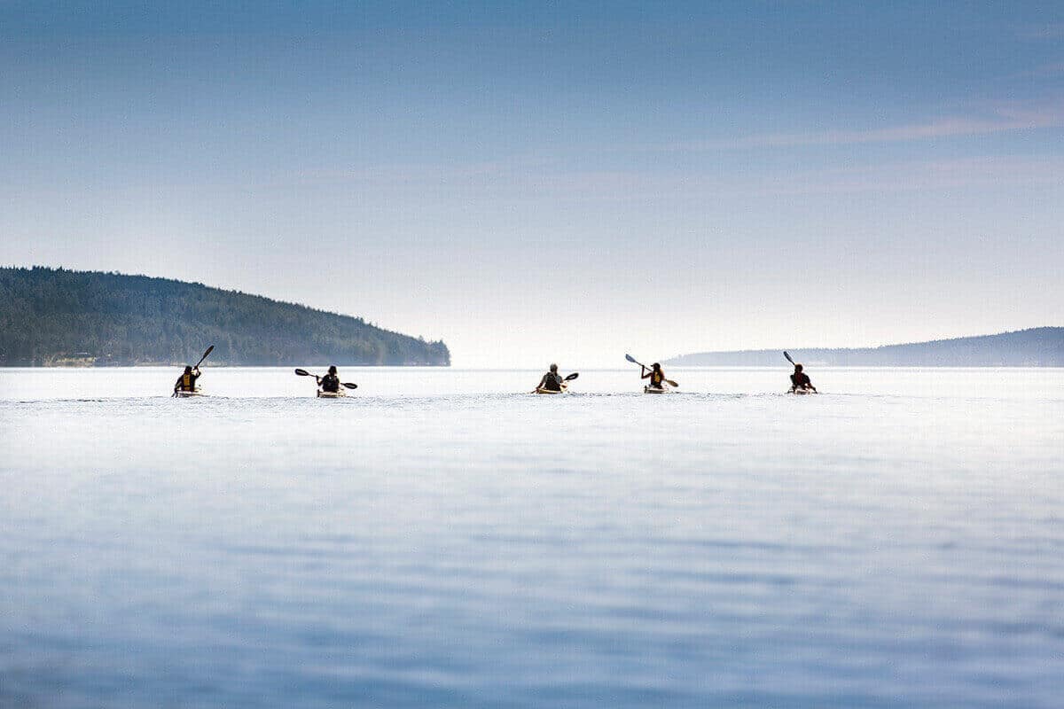 Melker kayaks on the High Coast of Sweden.